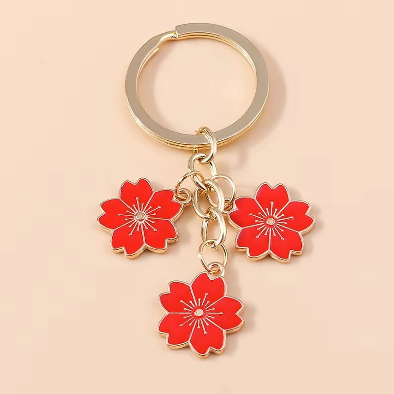 Aihua 40 Colors Cute Plant Keychain Enamel Sakura Flower Keyring for Women Girl Handbag Pendant Car Key Holder DIY Jewelry Gifts