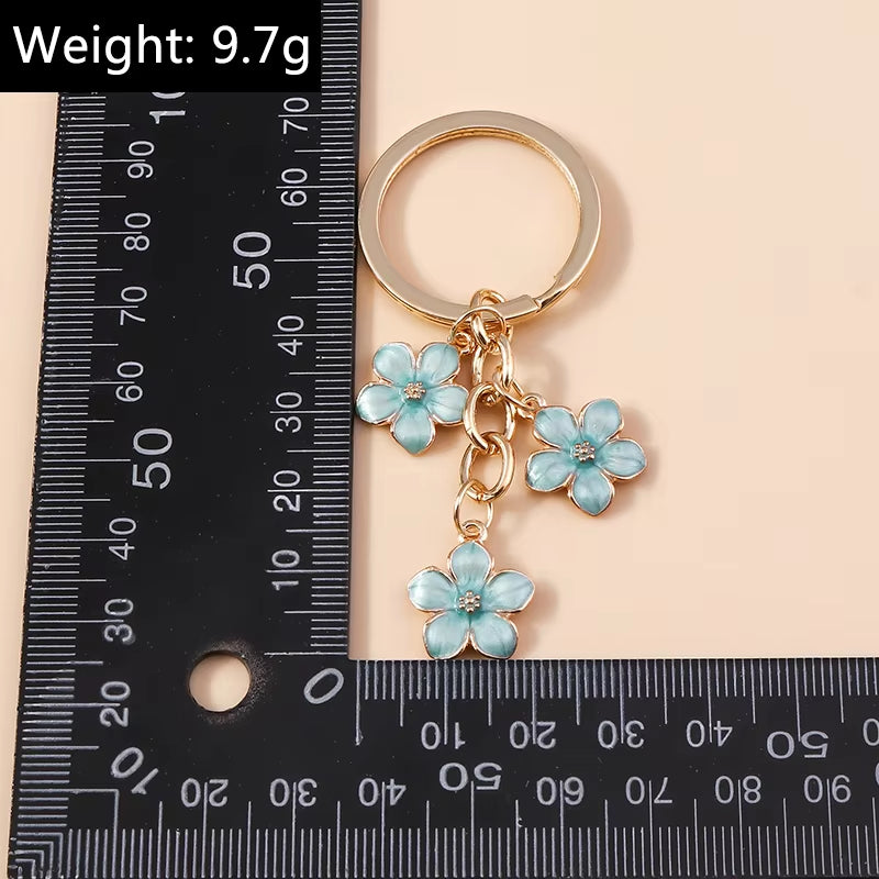 Aihua 40 Colors Cute Plant Keychain Enamel Sakura Flower Keyring for Women Girl Handbag Pendant Car Key Holder DIY Jewelry Gifts